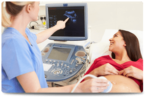 ultrasound pregnancy of technician and woman